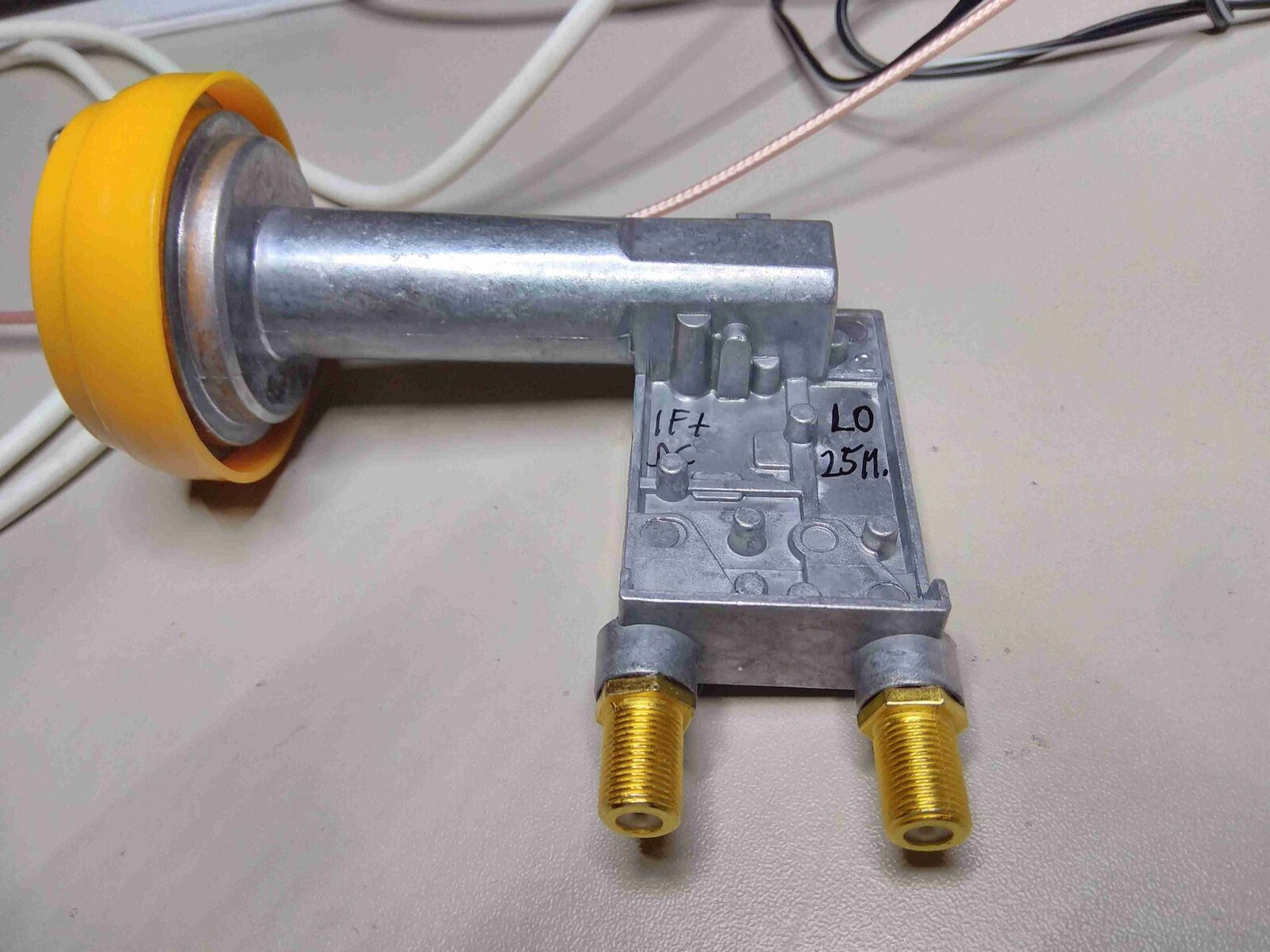 Finished Golden Media 202 LNB with the reference input connector marked LO 25M