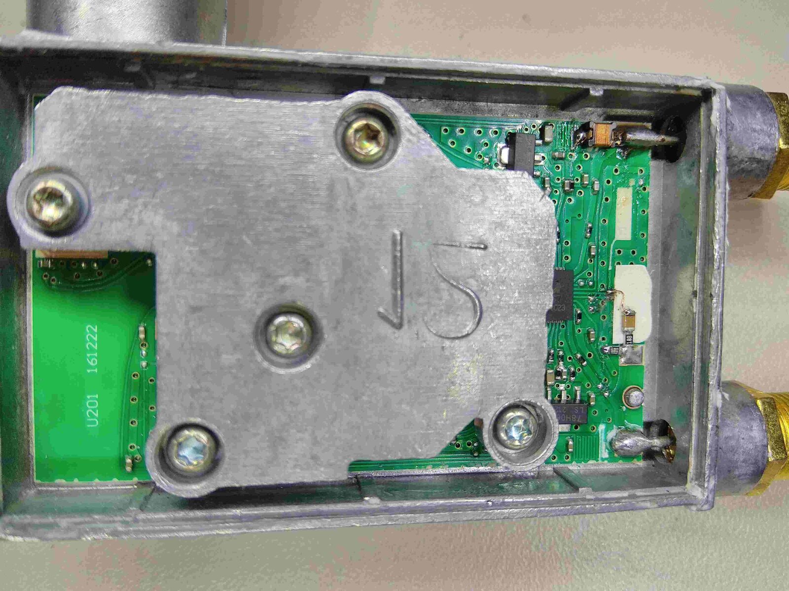 Golden Media 202 LNB board in its housing with the metal shield can in place