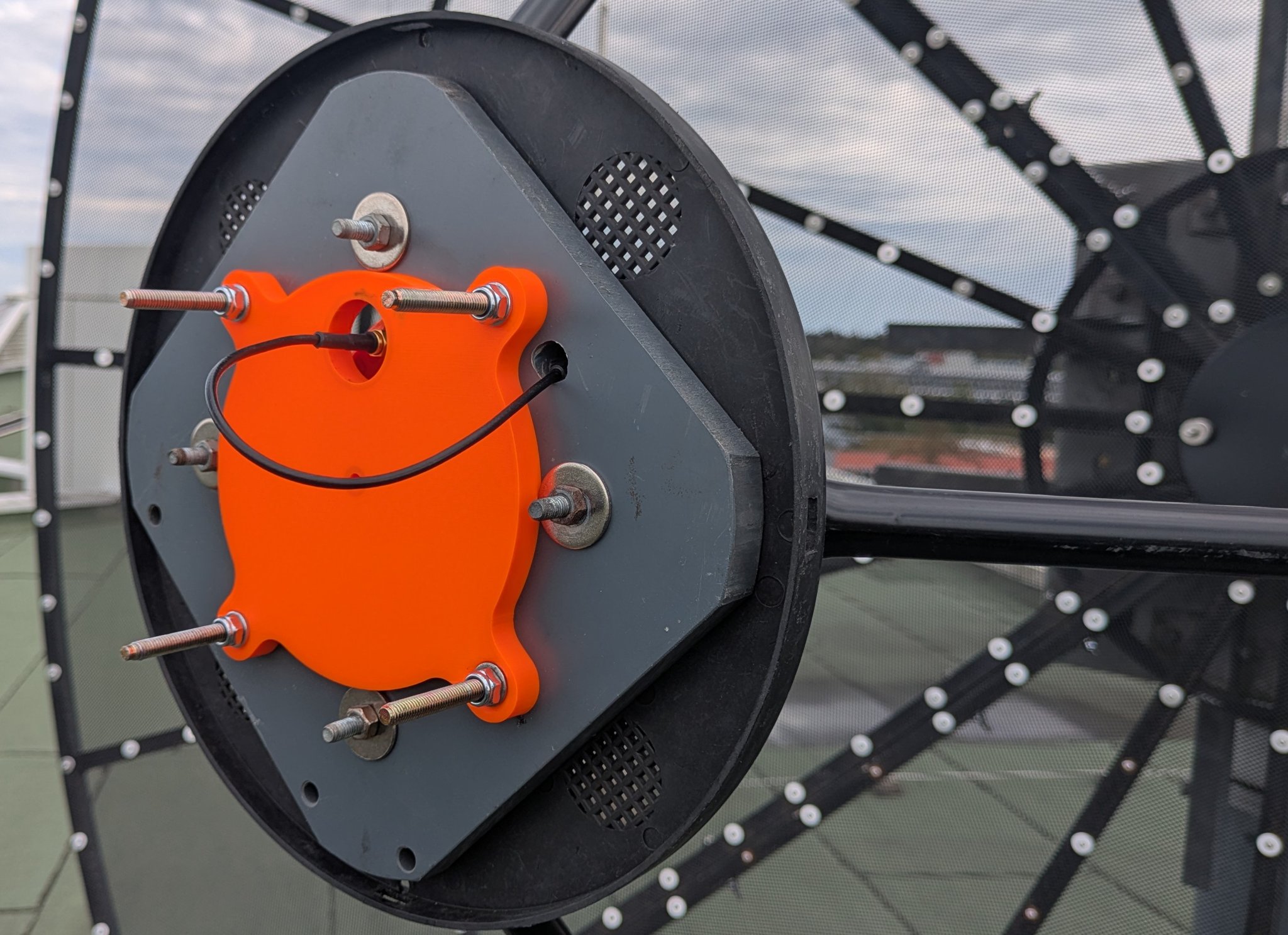 3D-printed adapter plate on the SAMI feed plate with the feed pigtail